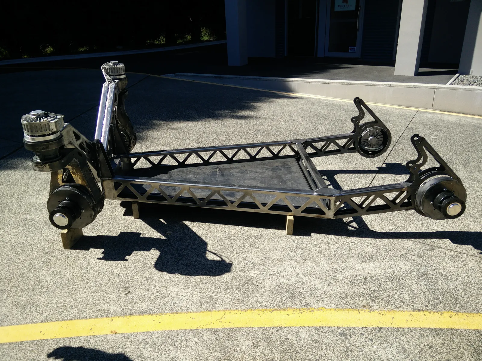 The bare chassis outside the workshop after welding