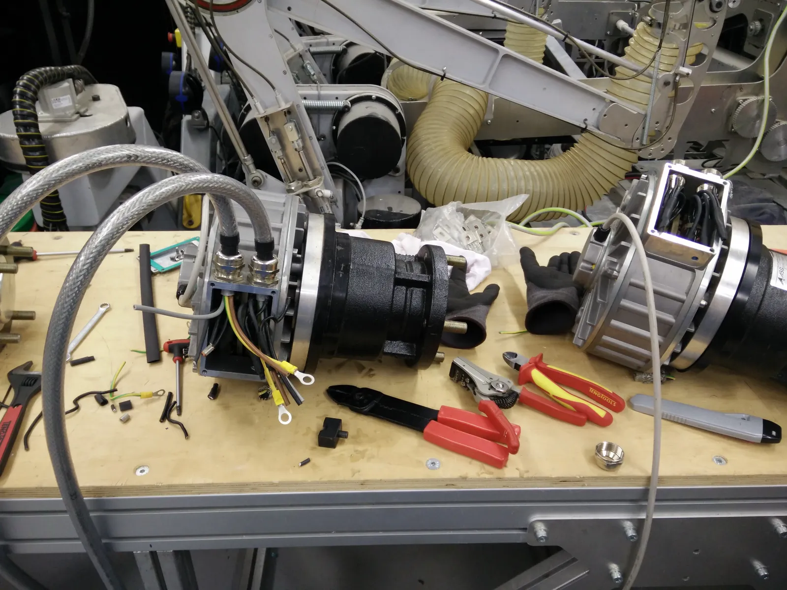 Hub motor on the workbench during rewiring