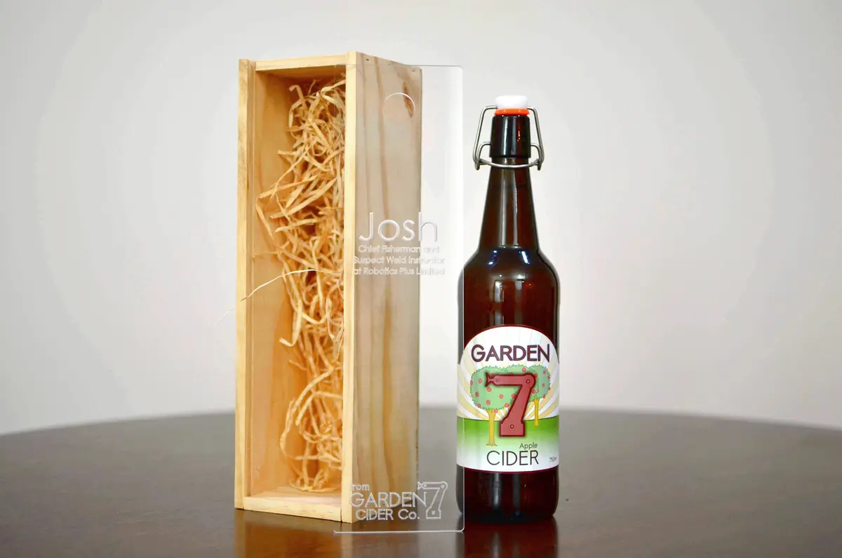 Bottle next to the engraved acrylic window